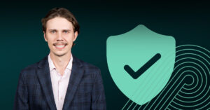 Cover image for a blog post about AIUC-1. Image features a picture of the author against a stylized green background.