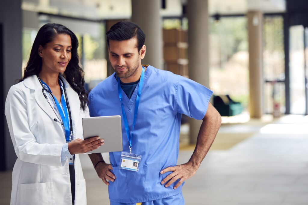 Professionals working confidently with technology in highly regulated industries, including healthcare and finance.