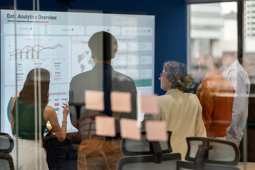 A business professional examines data to ensure it’s aligned with their organization’s data retention policy.